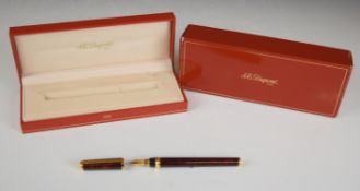 St Dupont of Paris fountain pen with marbled resin body and cap, gold plated fittings and 18ct