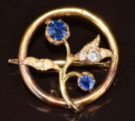 Yellow metal brooch set with two sapphires, the largest 0.35ct and rose cut diamonds, 3.8g, 2.2g