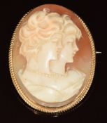 A 9ct gold brooch set with a cameo of two women, 10g, 3.2 x 4.3cm