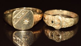 A 9ct gold signet ring (4.2g, size Z) and a 9ct gold buckle ring (3.2g, size T)