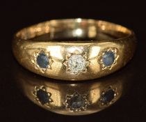 Edwardian 18ct gold ring set with an old cut diamond and sapphires in star settings, Birmingham