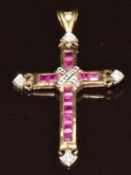 A 9ct gold cross pendant set with diamonds and synthetic rubies, 1.4g, 3.5 x 2cm