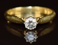 WITHDRAWN An 18ct gold ring set with a diamond of approximately 0.3ct, 2.7g, size K