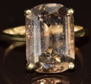 A 9ct gold ring set with a mixed cut smoky quartz, 3.8g, size P