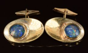 A pair of 9ct gold cufflinks set with opal doublets, 16g