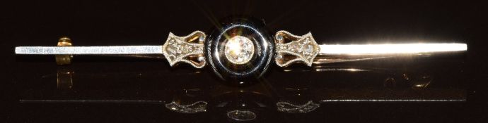 Art Deco 15ct gold brooch set with onyx, an old cut diamond of approximately 0.15ct and rose cut