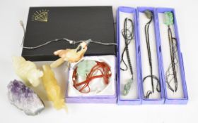 A collection of jewellery and hardstone including jade style pendants, silver necklace, etc