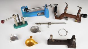 Four shotgun cartridge re-loading tools comprising Hercules 12 bore roll turnover tool, capper/ de-