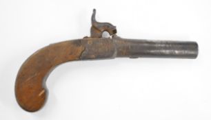 Unnamed percussion hammer action pocket pistol with engraved lock and hammer, chequered grip, vacant