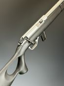 Mossberg 802 Plinkster .22 bolt-action rifle with thumb-hole grip, composite stock, multi-shot