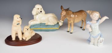 Beswick and Border Fine Arts poodle figures, Beswick donkey and a Nao figure of a girl with
