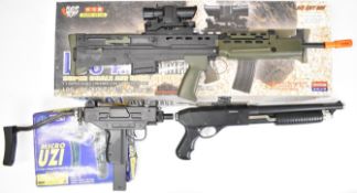 Three airsoft guns comprising Cybergun Micro Uzi, Hop Up L85-A1 assault rifle style and an Auto
