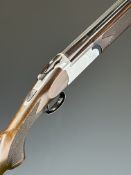 Maroochi 12 bore over and under ejector shotgun with engraved locks, underside, trigger guard and