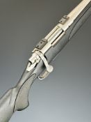 Remington Model 700 .243 Winchester bolt-action rifle with composite stock, textured semi-pistol