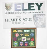 Two shooting related shop display or advertising signs 'Eley Leading Shooting Performance The