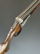 Parker Brothers Trojan 12 bore side by side shotgun with named locks, chequered semi-pistol grip and
