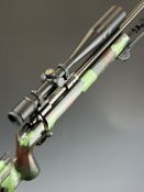 Winchester .308 bolt-action target rifle with textured semi-pistol grip, raised cheek piece,