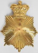 Gilt metal shako plate style badge with Queen's crown, height 16.5cm