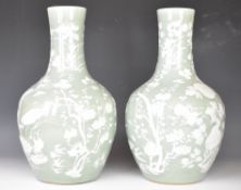 Pair of 19thC Chinese celadon and slipware glazed vases with floral decoration, H42cm