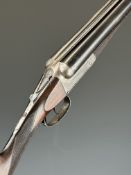 E J Bland 12 bore side by side ejector shotgun with named locks, engraved underside and thumb lever,