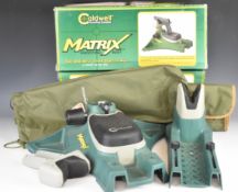 Caldwell Matrix shooting rest, in original box and a Tourbon shooting mat, in carry bag.