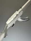 Ruger Model 10/22 .22 semi-automatic rifle with composite stock, textured semi-pistol grip and