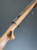 CZ 452-2E ZKM .22 bolt action rifle with no bolt, laminated show wood stock, thumb hole grip, raised