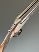 English 12 bore side by side shotgun with engraved locks, underside, trigger guard, top plate, thumb