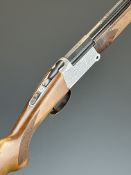 Investarm .410 folding over and under poacher's shotgun with engraved locks, underside and top