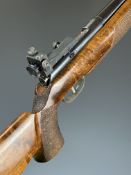 Unique Model 66 .22 left handed bolt-action target rifle with shaped and textured semi-pistol