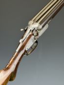 Midland Gun Company 12 bore side by side hammer action shotgun with engraved locks featuring