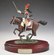 Waterloo era French pewter cuirassier on plinth inscribed 'Soldat Premier Regiment De Cuirassier