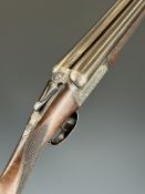 William Evans 12 bore side by side ejector shotgun with named and engraved locks, scrolling