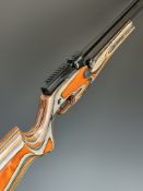 Reximex Pretensis .177 PCP air rifle with laminated show wood stock, semi-pistol grip, 14 shot