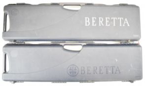 Two Beretta shotgun cases, both with fitted interiors for an over and under shotgun, each 96cm long.