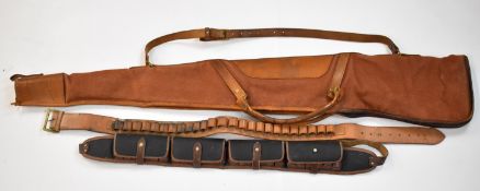 Leather and canvas shotgun or rifle slip together with two similar shotgun cartridge belts.