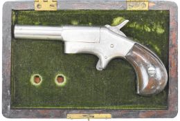 Unnamed .32 rimfire Derringer pistol with wooden birdshead grips, sheath trigger and 2.75 inch