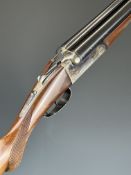 Spanish 16 bore side by side shotgun with engraved locks, underside and thumb lever, chequered