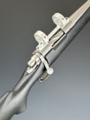Remington Model 700 Titanium .308 Winchester bolt-action rifle with composite stock. semi-pistol