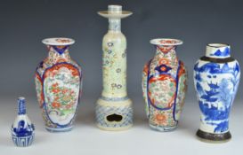 Collection of 19th/20thC Chinese and Japanese vases and a candlestick, tallest 30cm