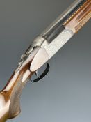 Lincoln 12 bore over and under ejector shotgun with engraved locks, underside, trigger guard, top