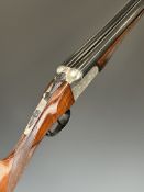 Gunmark Kestrel 20 bore side by side ejector shotgun with engraved scenes of birds to the locks