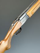 Baikal NX-27E-1C 12 bore over and under ejector shotgun with engraved locks and trigger guard,