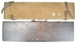 Two vintage shotgun carry cases, one leather the other canvas and leather, each approximately