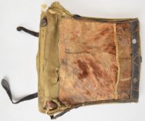 WW1 German canvas backpack with internal frame and cow hide cover to back and ink stamped 1915,