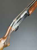 Remington Model 1100 12 bore 5-shot semi-automatic FAC shotgun with ornately carved and chequered