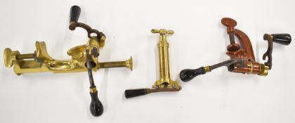Three shotgun cartridge re-loading tools comprising two G&JW Hawksley 12 bore roll turnover tools
