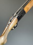 Lanber 12 bore over and under shotgun with border engraved locks, underside, top plate and thumb