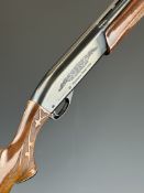Remington Model 1100 LH 12 bore 3-shot semi-automatic shotgun with ornately carved and chequered