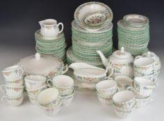 Royal Worcester dinner and tea ware decorated in the English Garden pattern, approximately one